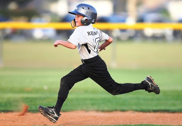 Boy Reaching for the Goal