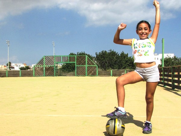 Child Playing Soccer