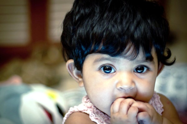 Child Nibbling on her Nails