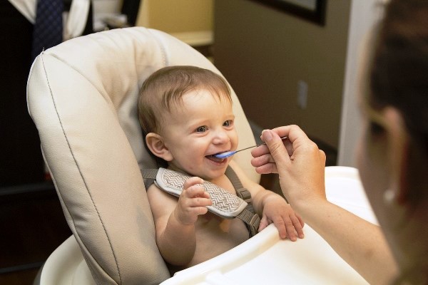 Little Boy Enjoying his Meal