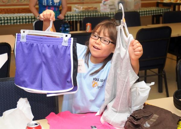 Girl Choosing her Clothes