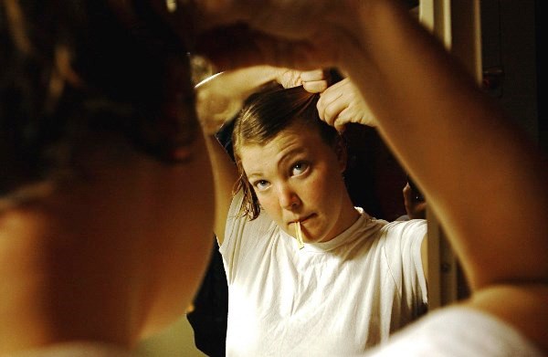 Girl Fixing Hair