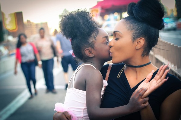 Mother & Daughter Showing Love