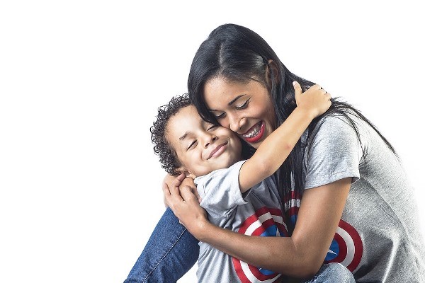 Mother Hugging her Son